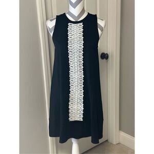 Sleeveless lace embellished black dress